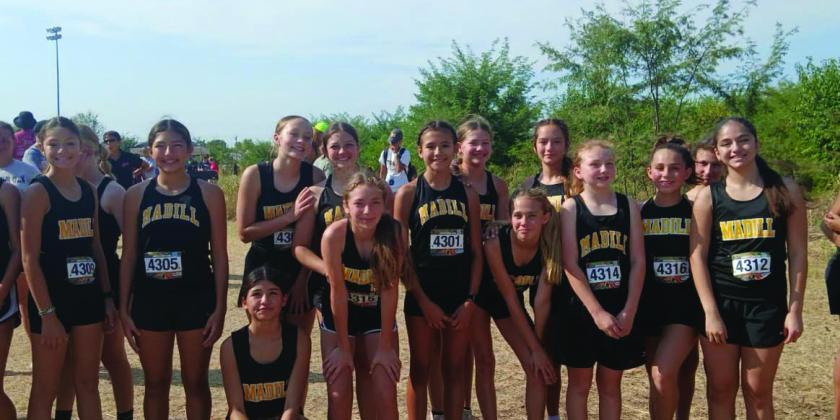 Courtesy photos The Madill Junior High School boys, pictured left, and girls, pictured right, cross country teams took first in the Red River Showdown on August 24. The Madill High School boys and girls teams took 4th and 6th place, respectively.
