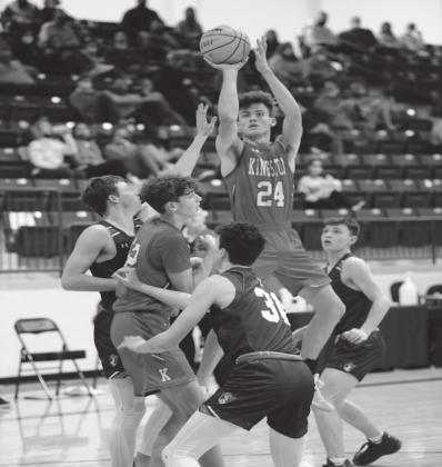 Brayden Matchen takes a shot while being covered by the opponents during the tournament ending game against Christian Heritage Academy on March 5, 2021. Crockett Uber