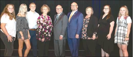 Courtesy Photo Chickasaw Nation Governor Bill Anoatubby, center, is joined by his family at Chickasaw Nation Inauguration ceremonies, Oct. 1 in Ada. From left, Preslea Anoatubby, Chloe Anoatubby, Brendan Anoatubby, Janice Anoatubby, Governor Anoatubby, Lt. Governor Chris Anoatubby, Becky Anoatubby, Eryn Anoatubby, and Sydney Anoatubby.
