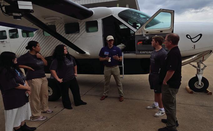 AJobyAviation representative teaches intrigued onlookers. Charles White • The Madill Record