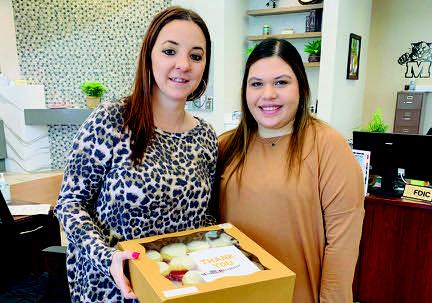 The Madill Record shows their appreciation to First National Bank of Madill for being a loyal customer by gifting cupcakes from Sourdoe's Bakery on March 20. Leslie Mowles • The Madill Record