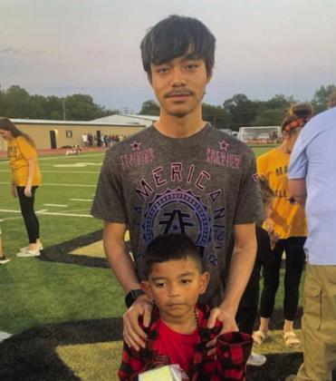 MHS senior Fabricio had the honor of passing the Wildcat spirt to his little brother, Gabriel. Andrea Dunlap • The Madill Record