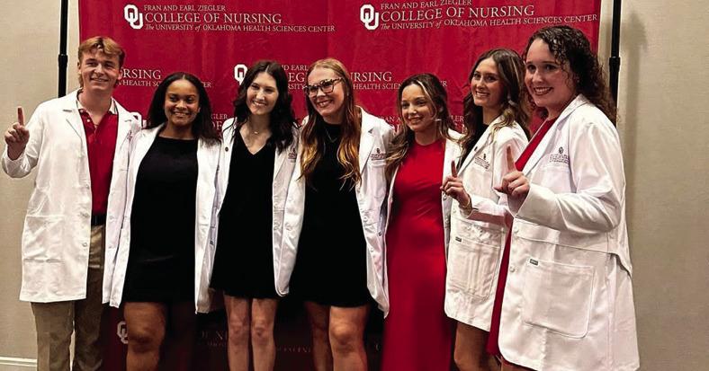 Madill alum Autumn Bryant, pictured second from left, received her white coat during the White Coat Ceremony, signifying her acceptance into the OU Nursing Program. Courtesy photo