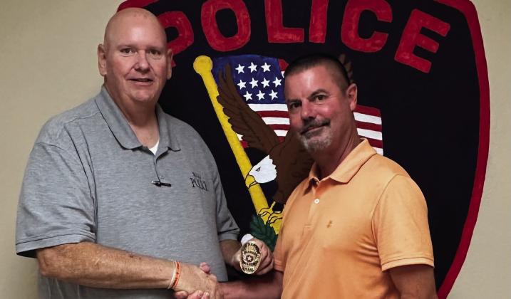 Donny Raley, left, is welcomed as the new Madill Police Chief by Madill City Manager James Fullingim, right. Photob by Trace Cain