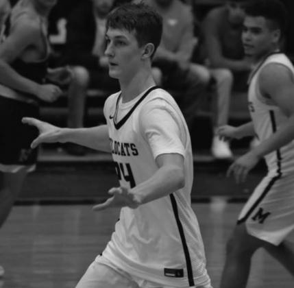 Nick Northcutt runs down court during a game. Summer Bryant · The Madill Record
