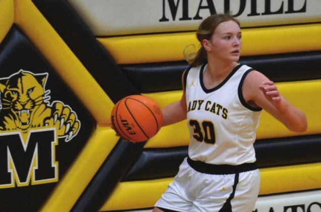 Lydia Landgraf searches for an opening during theLady Wildcatsl v Plainview Lady Indians game on February 11, 2022. Summer Bryant • The Madill Record