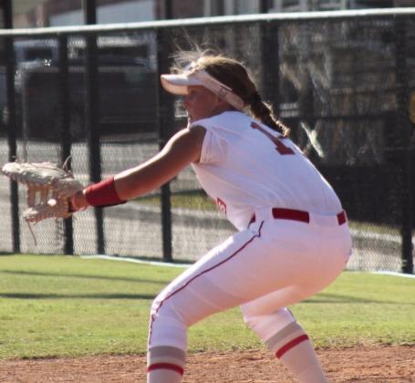 Lady Redskins split district games with win