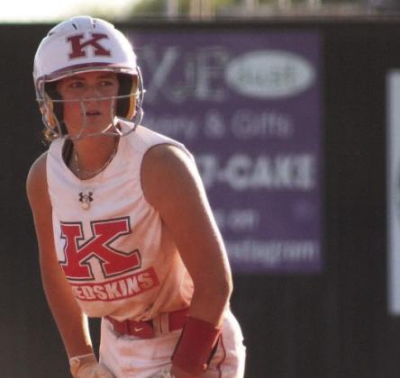Pictured left: Freshman Khole Hall secures an out on first base. Pictured right: Senior Jayda Foster steadies herself after hitting a double. Courtesy photos