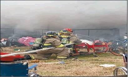 Courtesy photo Gerald and Judy Jenkins woke up to their house on fire on New Year’s Day. The home was a total loss.