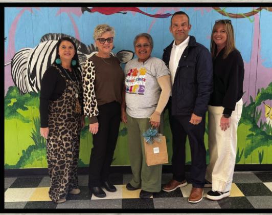 Maria de la Cruz was named the district Support Staff of the Year.