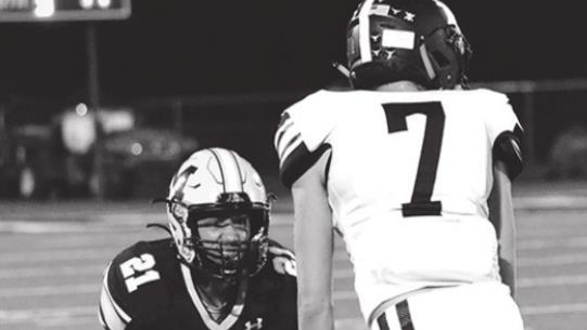 Ezekiel Fuentes prepares to clash with the Lone Grove Longhorns on October 22, 2021. The Wildcats lost their pink out game 28-21. Summer Bryant • The Madill Record