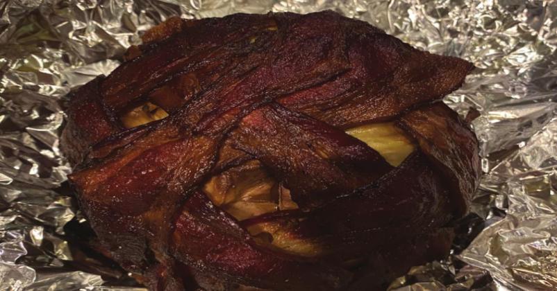 A “Smoked Martian Head” makes for a spooky dish at your next Halloween bash. Tom Stewart