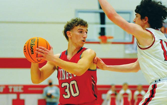 Tucker Rumer fights off his opponent during the Kingston v Comanche game on January 26, 2021. Crockett Uber