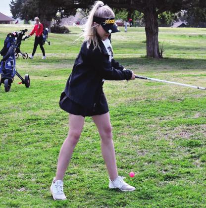 Jaelen Williams takes a practice swing at the golf tournament in Sulphur on April 6, 2021. Jennifer Rushing