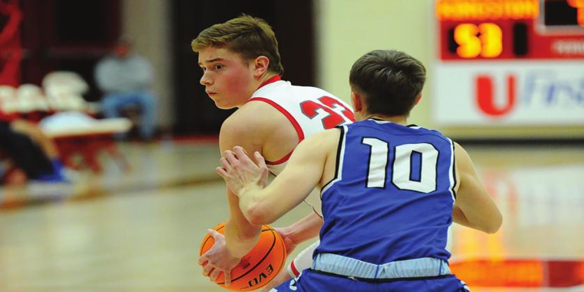Drew Capps goes one-on-one with a Comet during the Kingston v Dickson game on February 12, 2021. The Redskins walked away with the win, 67 to 43. Crockett Uber