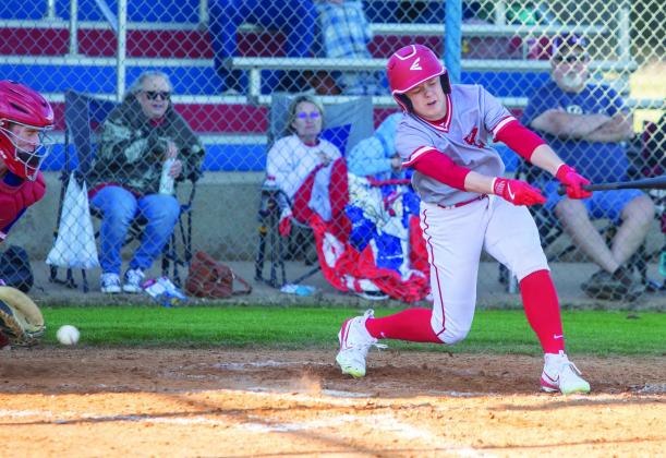 Ethan Mowles swings at a pitch. Matt Swearengin