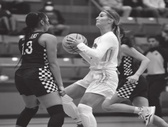 Raegan Davis zeroes in on the basket to try and score during the Kingston v Marietta game. Crockett Uber