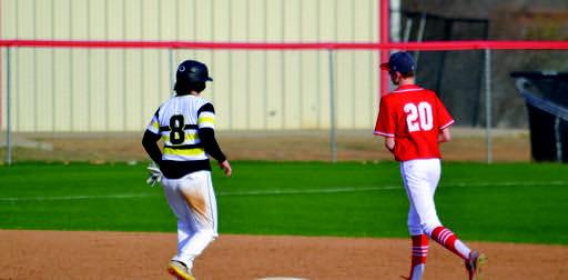 The Kingston Redskins baseball team opened the season with a doubleheader sweep at Coalgate on March 4. Brock Rumer runs the bases during the Kingston v Madill scrimmage game on February 25. Leslie Mowles • The Madill Record