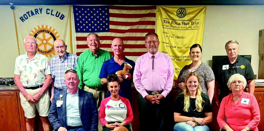 Bill Simmons, pictured holding stuffed goat, conducted his first meeting as Rotary Club President on July 11. Simmons was previously the Vice President before taking on the role as President. Courtesy photo
