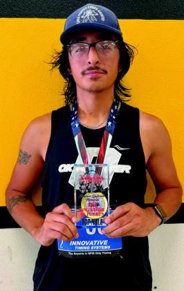 Juan Flores, top male of the 5K