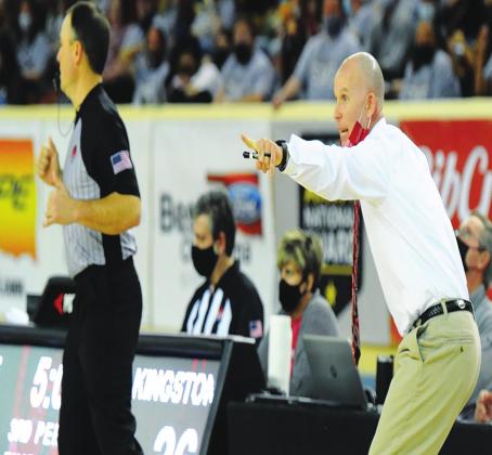Coach Chad Rumer gets animated during the nail-biting game between Kingston and Kellyville. Unfortunately, the girls lost. Crocket Uber