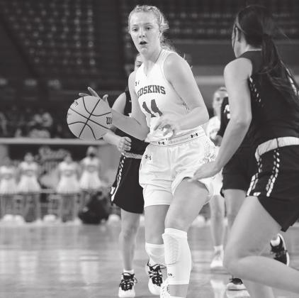 Avri Weeks dribbles down the court during the season-ending game against Kellyville. Crockett Uber