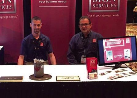 Charlie Gay, owner of CK Sign Services, right, and his associate, Joby Carpenter, at the Native American Trade Show. Courtesy photo