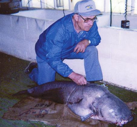 Courtesy photo Dan Grider holds the record for the largest blue catfish. It measured a whopping 118 lbs. and eight oz., 57 inches long with a 41 3/4 girth. It was caught on Lake Texoma by a Jugline on May 4, 1988.