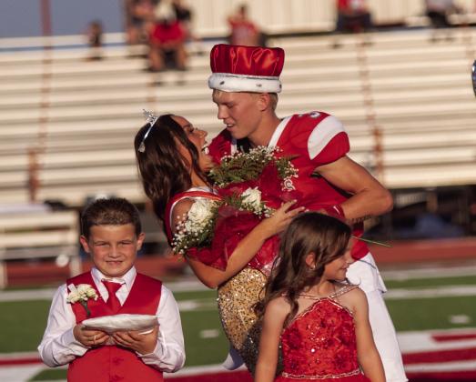 Jaci Herndon represents cheer and Elie Oliger represents football. Matt Swearengin