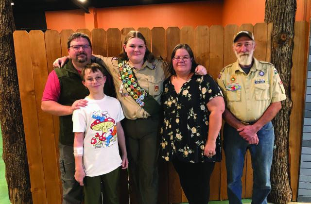 From left to right: James Jackson, Zachary Jackson, Jadyn Jackson, Amy Jackson, and Eagle Review Board Chair Dwight Odell. Courtesy photo