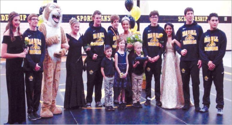 Courtesy photo Above: MHS Wrestling homecoming court (left to right) Abby Zang (freshman), Chris Bennett (senior), James Page as Willie the Wildcat, Abbie Tiernan (junior), Coty Tweedy (senior), Israel Hernandez (crown bearer), Wylbe Roberts (senior), Cora McGee (flower girl), Autumn Bryant (sophomore), Silas Hart (crown bearer), Jacob Massey (senior), Alejandra Salas (senior), John Venable (senior), Edwin Recio (senior).