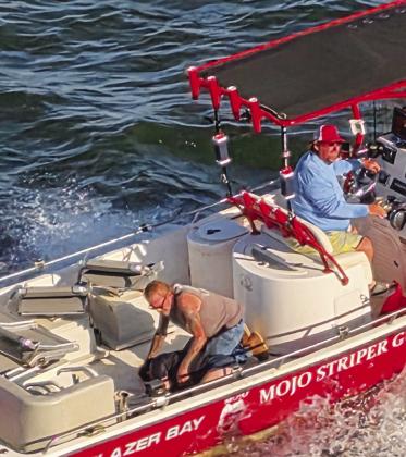 The quick actions of a striper guide and a construction crew saved a woman after she jumped from the Willis Bridge. Charles White • The Madill Record