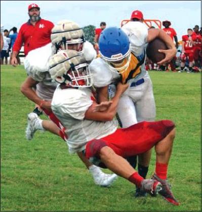 Photo by Lori Robinson • The Madill Record The Kingston Redskins hosted the Ringling Blue Devils and the Idabel Warriors during a double header scrimmage last Friday.