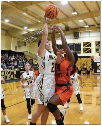 Wildcats ride free throws to topple Tigers