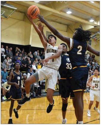Wildcats ride free throws to topple Tigers