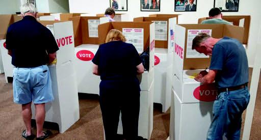 Voters are seen casting their ballots for the primary election at the St. James AME Church in Arcadia on June 28, 2022 Whitney Bryen • Oklahoma Watch