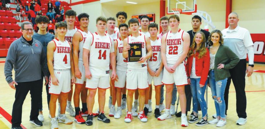 On Feb. 21, the Kingston Redskins basketball team became the District Champs. Crockett Uber • The Madill Record