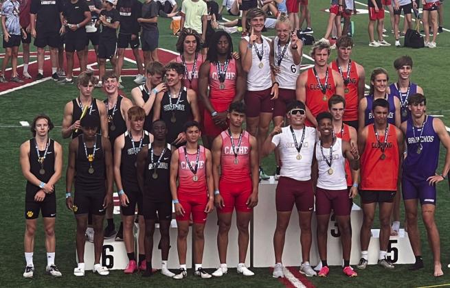McCray Tripp, Blaze Adams, Tyrone Glover and Bode Shahan (left) took 6th place in the 4x400 meter relay. Courtesy photo