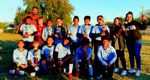 Team members are: left to right front row; Bryssa Saenz, Braysen Carnes, Akzel Fernandez, Teo Barrientos, Chris Flores, Brayan Padron. Left to right back row; Gael Flores, Dylan St. Clair, Elijah Grimaldo, Leonardo Padron, Joshua Gomez, Sebastian Rodriguez, Anthony Padron, Kenadi Mendoza. Coaches Humberto Grimaldo and Sandra Medina. Not pictured Hiram Guevara and Silas Hart. Courtesy photo