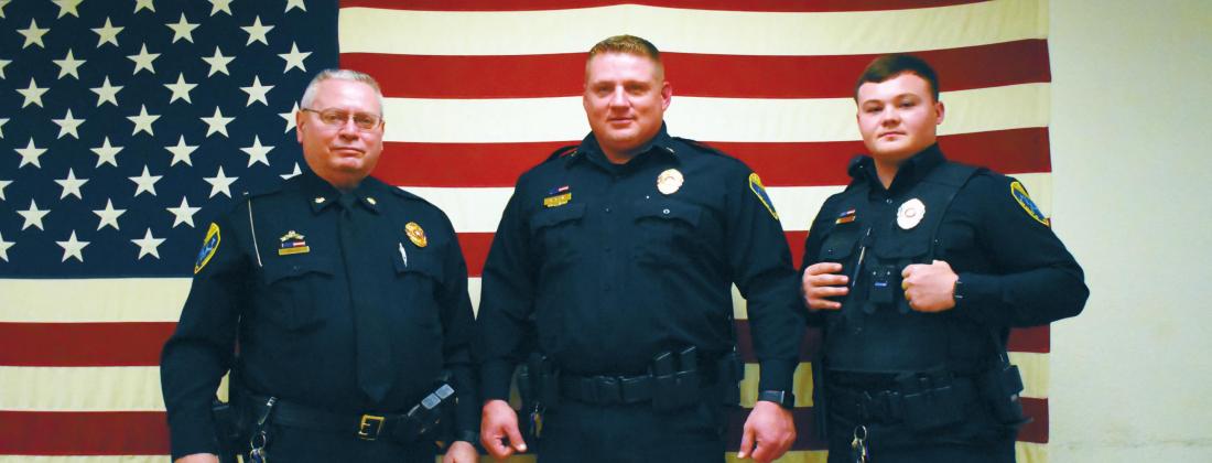 From left to right: Officer Steve Miller was promoted to Kingston Assistant Police Chief, former Assistant Police Chief Chris Watson was promoted to Police Chief and Officer Kevin Smith received a pay raise. James Bowser • The Madill Record