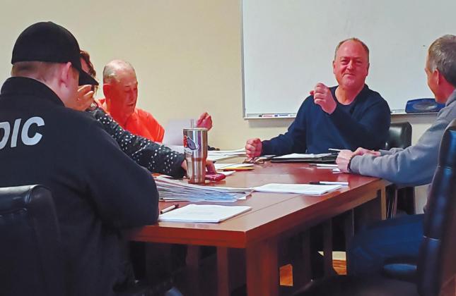 Marshall County EMS Interim Director Dash Stanley, and board members Elizabeth Wainwright, Roy Matheny, Darren Alexander, William Coleman, and Wes Saxon (not pictured) get ready for the February 6 MCEMS Board meeting. Shalene White • The Madill Record