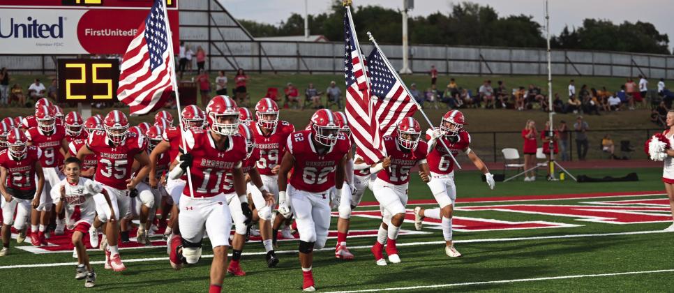 The Kingston Redskins storm the field before the Kingston vs. Madill game on August 25. Courtesy photo