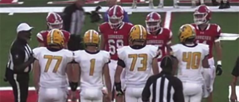 Madill and Kingston players stand on the line of scrimmage for the coin toss during the Marshall County Super Bowl game. Courtesy photo