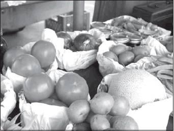 Farmers markets help families gain access to locally grown, healthy fruits and vegetables like these tomatoes, cantaloupes, onions and okra.