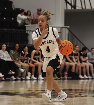 Lamiyah Brown dribbles down the court. Photo by Summer Bryant