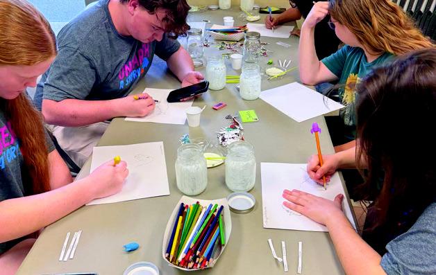Above and below: The Madill City-County Library held a summer reading program for teens and children.