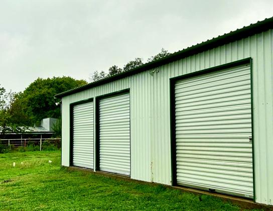 Courtesy photos Kathy Germany of S.O.A.R., along with volunteers, do their best to ensure Marshall County pets receive love and food. Just recently, S.O.A.R. added an enclosed area for the animals.