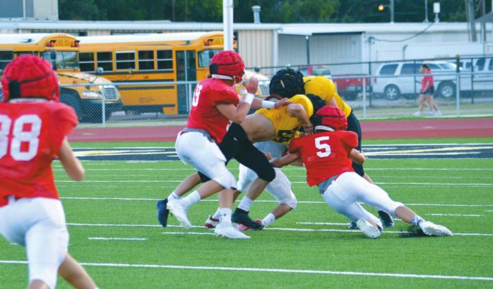 The Madill Wildcats faced the Davis Wolves for a scrimmage game on Friday, August 21. Summer Bryant • The Madill Record