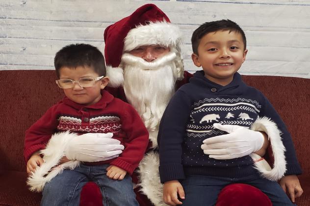 Santa and Mrs. Claus visit the library