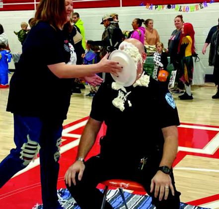 Kingston Animal Control hosted a fundraiser during the Town of Kingston Trunk or Treat. Some of the fundraiser was to see who was going to wind up with a pie to the face. The pie 'victims' were Kingston Police Chief Kasey Cox, Major Miller, Officer Russell, councilmember Danny Southerland, Kingston Fire Chief James Kyurkandall and Kingston Animal Control Officer Melissa Cruz. Courtesy photos